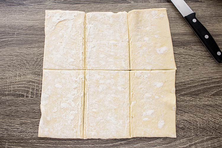 Pastry sheet laid out to show how to cut to make Easy Breakfast Pastries.