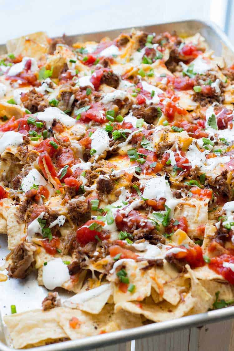 Tray of Nachos topped with Mexican Pulled Pork
