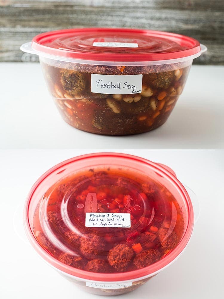 Instant Pot Meatball Soup in a large round plastic container labeled to come into the freezer for later use